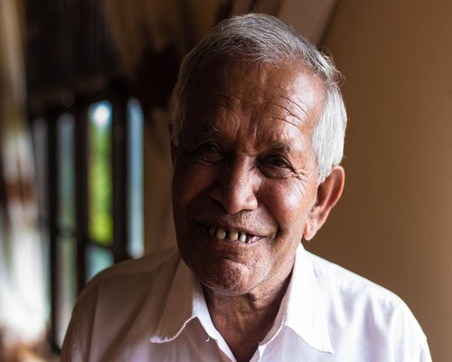 Portrait of an elderly Indian man smiling